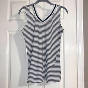 NWOT V cut, black & white striped sleeveless shirt. Size Small